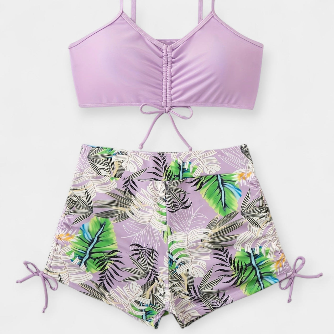 Magas derékú bikinifelső trópusi mintával és pántokkal