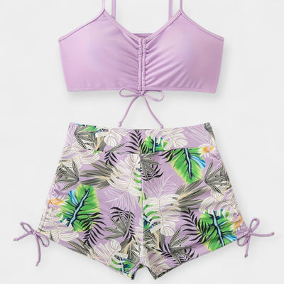 Magas derékú bikinifelső trópusi mintával és pántokkal