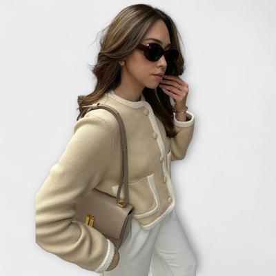 Klasszikus kardigán dekoratív zsebekkel