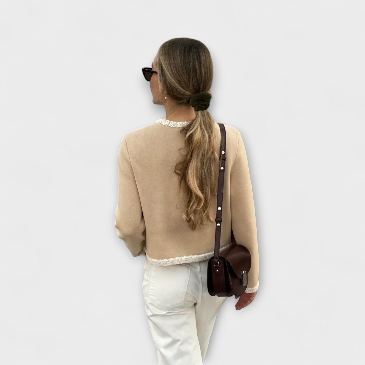 Klasszikus kardigán dekoratív zsebekkel