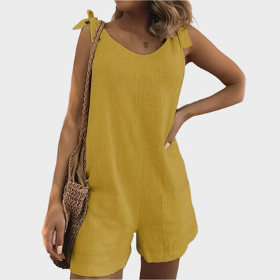 Teljes hosszúságú játszóruha masnis pántokkal és zsebekkel